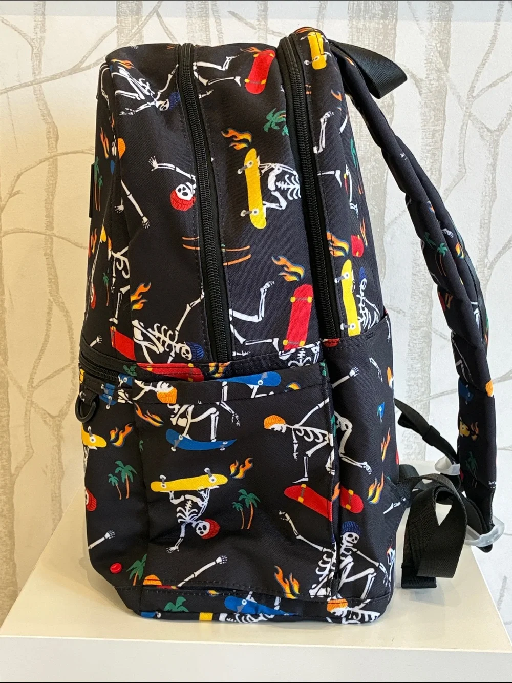 STATE Black Backpack with Multicolor Skate Skeleton Print